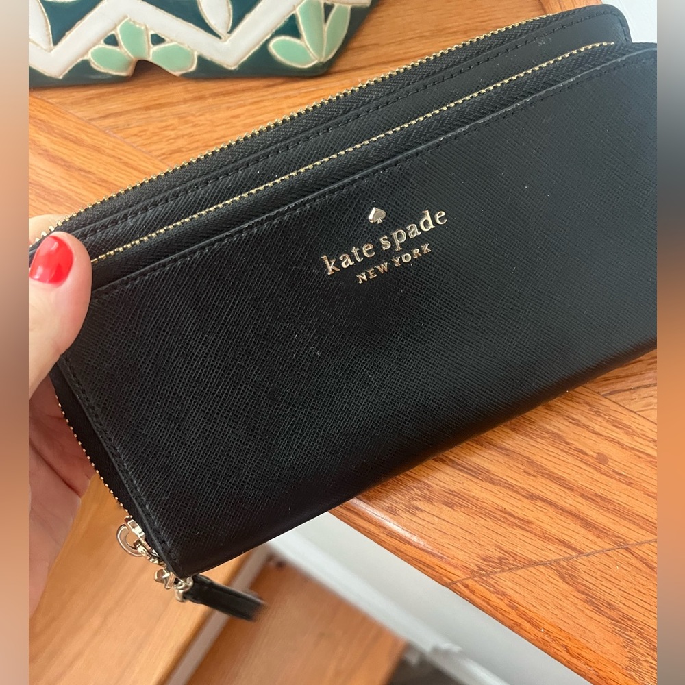 Gently used kate spade wallet gold and black